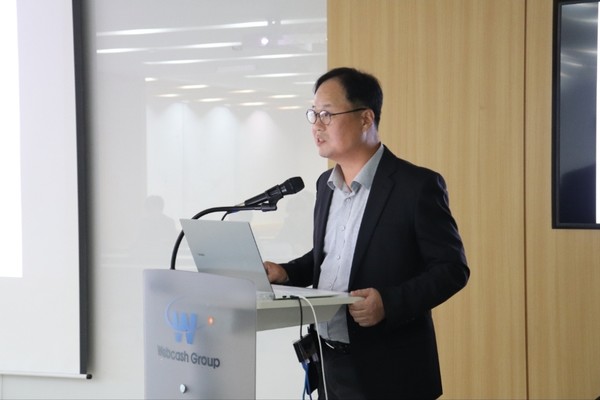 심석민 쿠콘 상무가 2025년 3분기 실적 및 향후 전략을 설명하고 있다. 사진/쿠콘